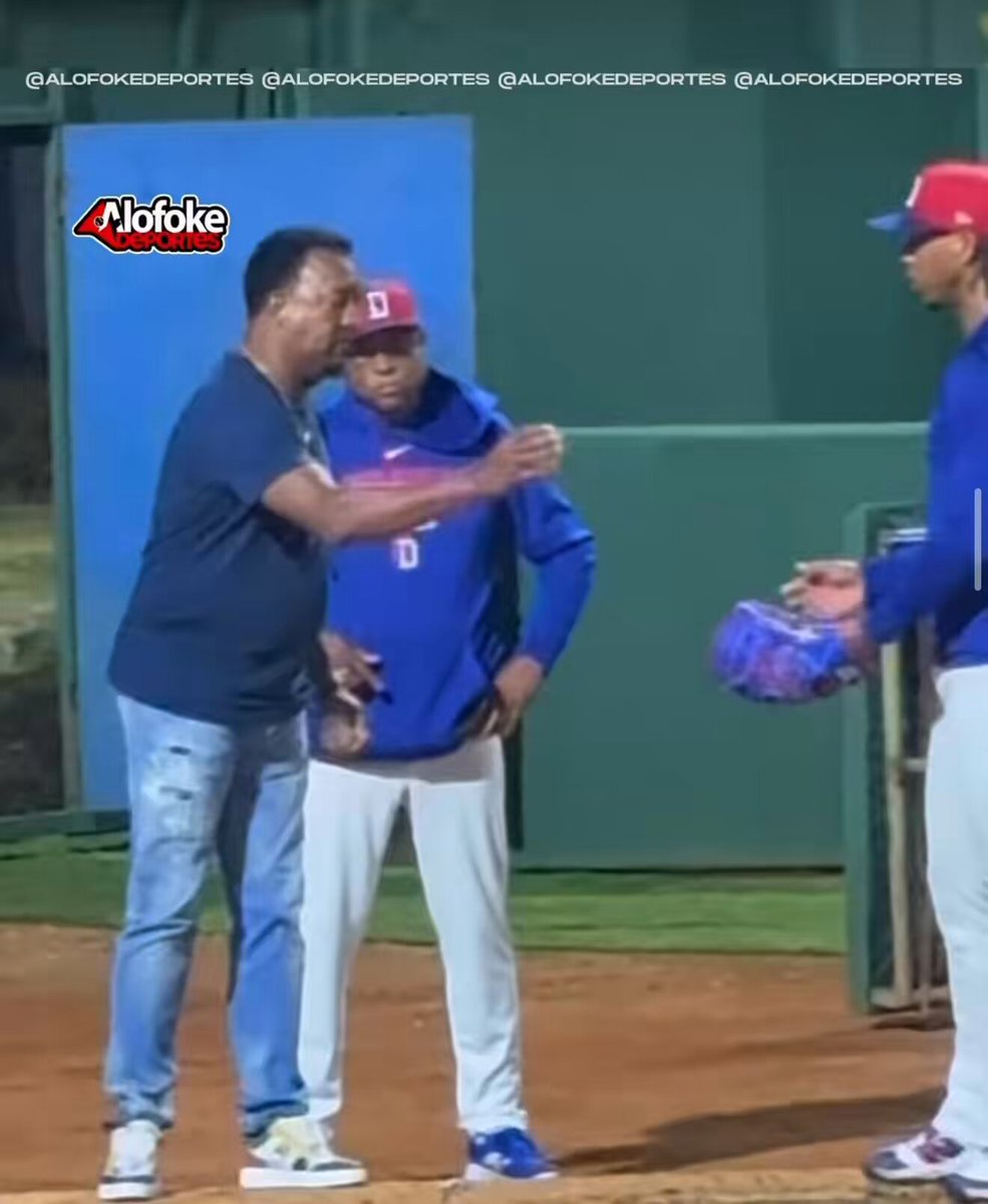 Pedro Martínez working with Brayan Bello, telling him something about his shoulder, grip and eyes.