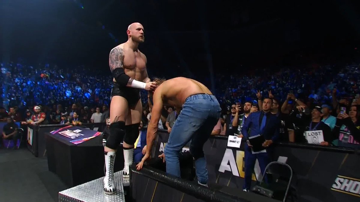 SPEAR OFF OF THE STAIRS INTO THE TABLE BY @CLARKCONNORS! Watch #AEWDynamite LIVE on TBS &amp; HBO Max