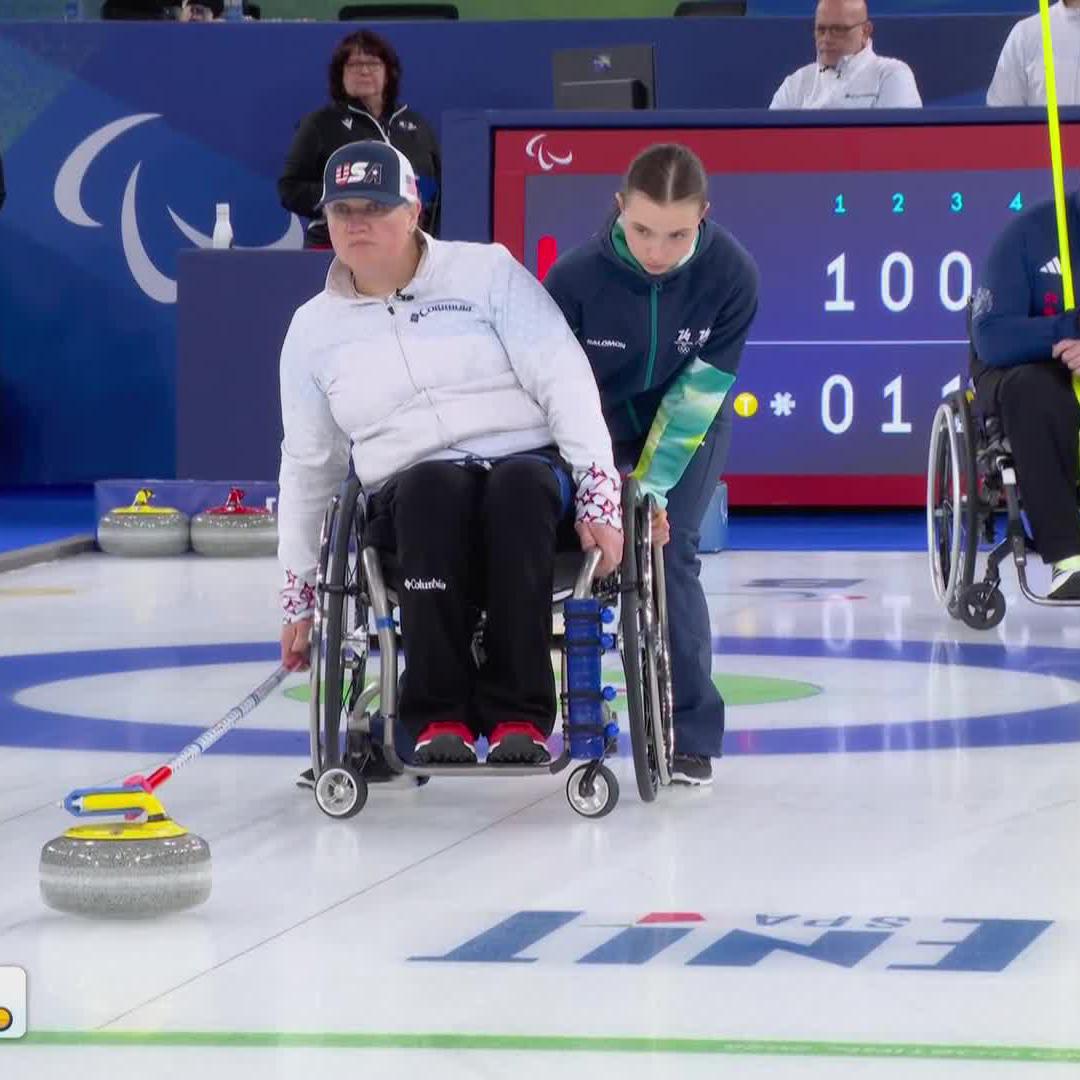 Laura Dwyer's throw curls right around Great Britain's stone for a Team USA point.