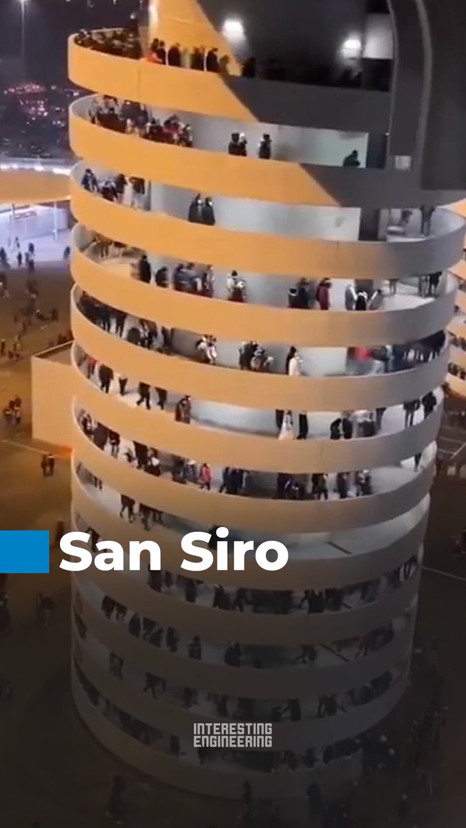 This building in the San Siro stadium in Milan is not rotating - whatever your brain tells you. It's an optical illusion caused by the downward motion of the people inside. Our brains interpret the motion as belonging to the rotation of the building.