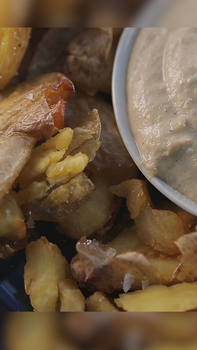 Talk about a SMASH hit 🤤🥔 Eric Greenspan pairs his crispy potatoes with a sweet and tangy caramelized onion and vermouth dip! Get the recipe: