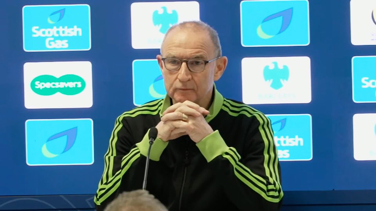 Martin O'Neill reacts to fans having to be separated on the pitch at Ibrox after Celtic's Scottish cup quarter-final win against Rangers.