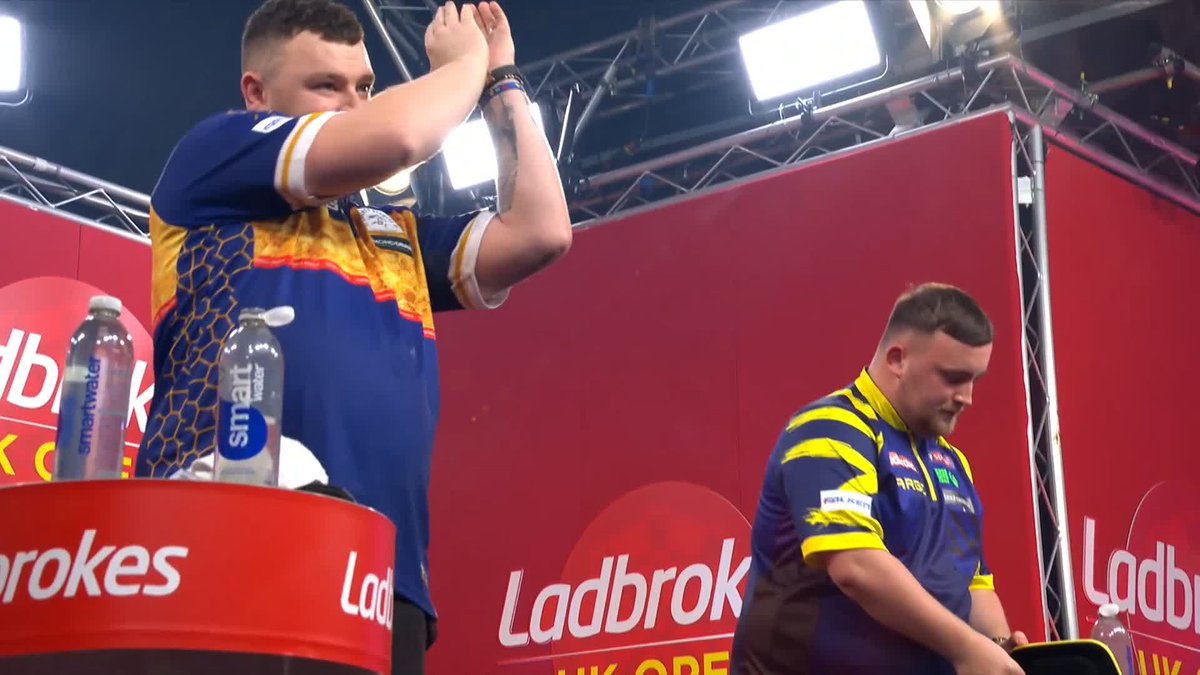 LITTLER INTO THE FINAL! ☢️ Luke Littler prevails in another dramatic semi-final! The world number one overturns a 5-1 deficit to sink Josh Rock and continue his bid for back-to-back titles! Live Scores & Streaming 📲 #UKOpenDarts | SF