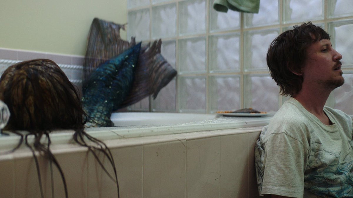 Fallout's Johnny Pemberton plays a drug addicted Florida man who finds a wounded mermaid in the action-comedy/horror movie Mermaid, swimming into theaters on April 8.