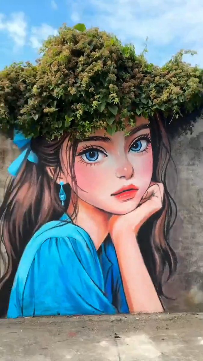Artist incorporates real flowers to create striking visual street pictures
