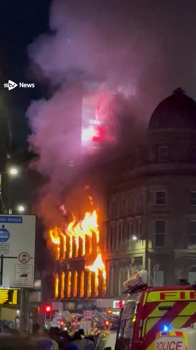 Watch moment LED screen collapses amid Glasgow building blaze.