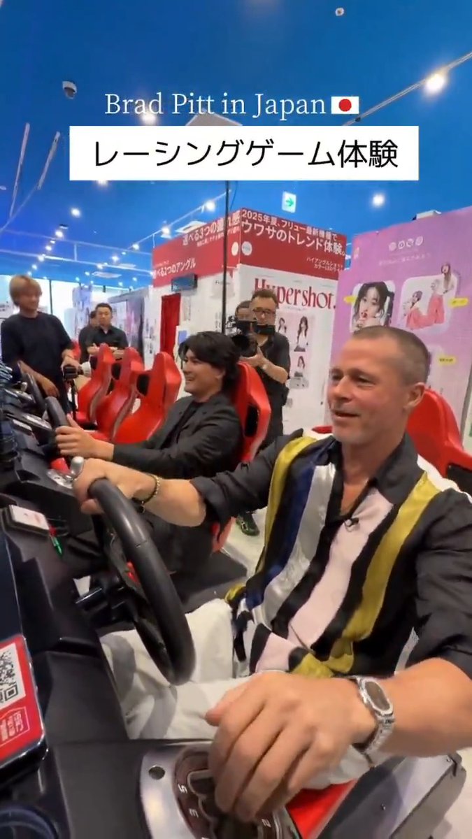 Brad Pitt playing Wangan Midnight: Maximum Tune in Japan during his promotion of the 2025 film F1