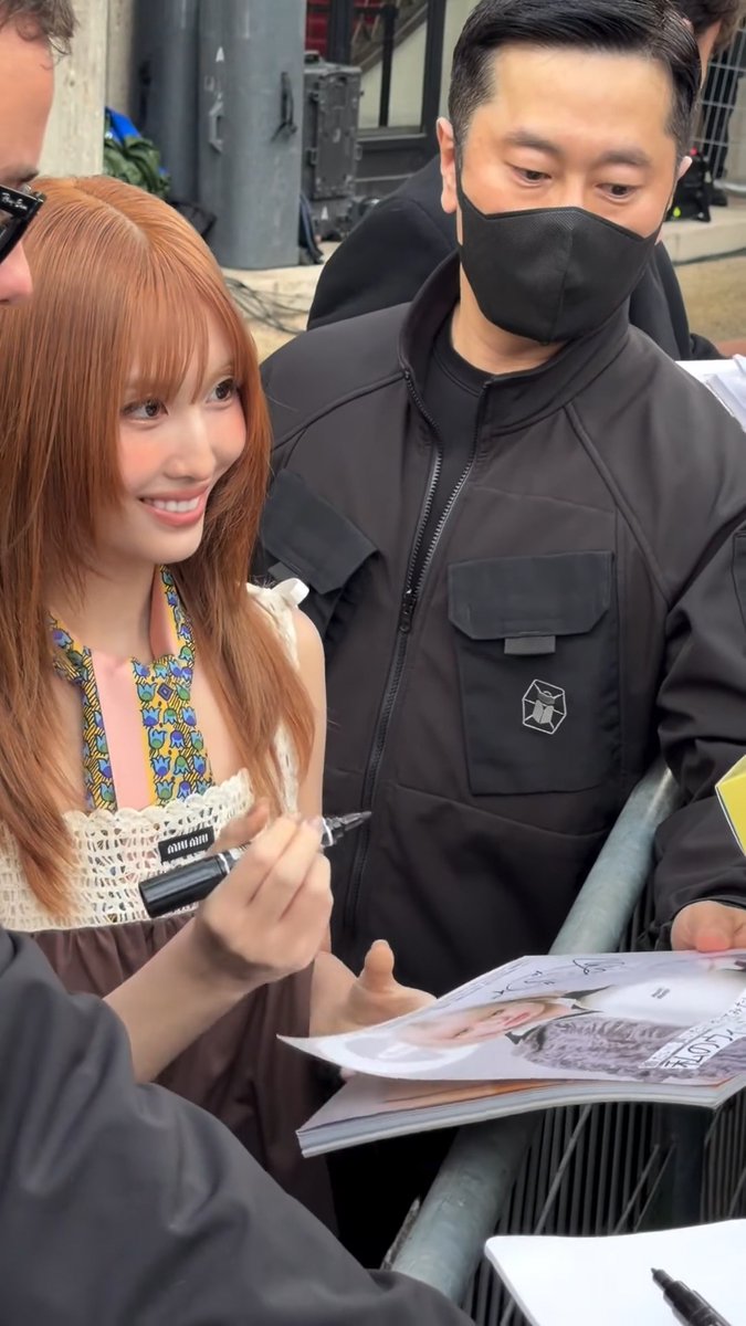 Momo signing for fans after the Miu Miu show!