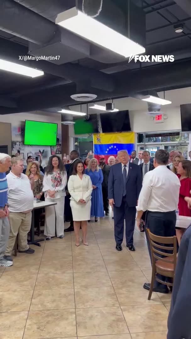 'BEST PRESIDENT': President Trump visits a local Venezuelan restaurant in Miami to say hello to customers and the owner who he says has been his friend 'for a long time,' before heading back to Washington, D.C. 'USA' chants echo through the restaurant as the president waves goodbye to customers.