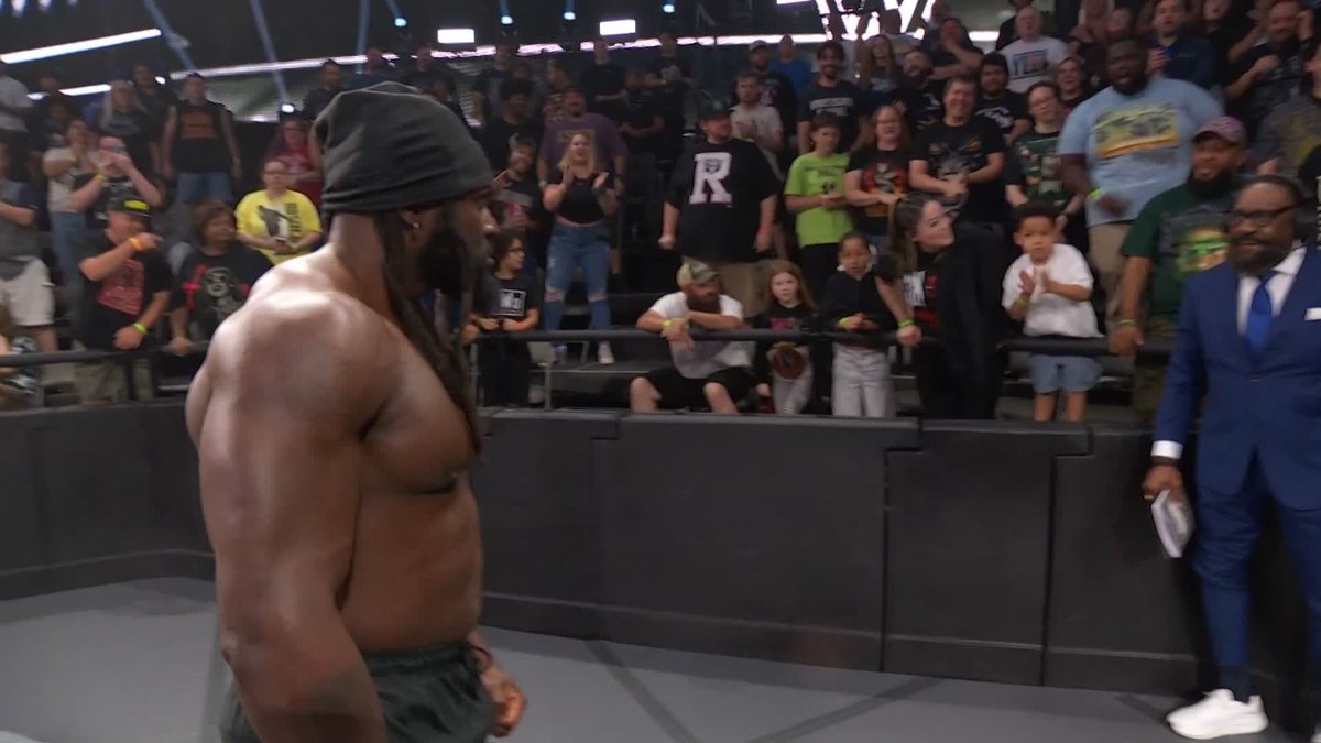 WHOA 😳 Keanu Carver just sent Jasper Troy THROUGH the announce table!