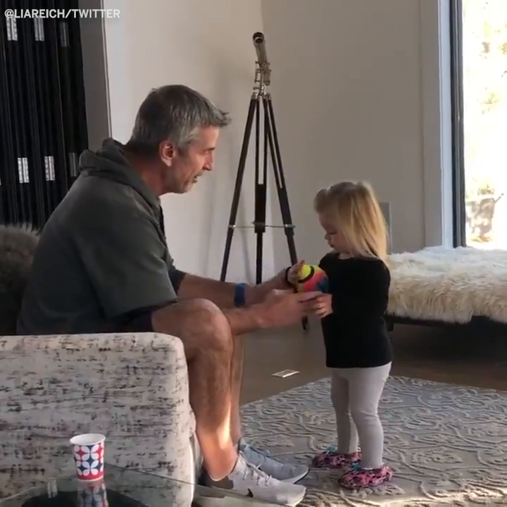 Frank Reich teaching his granddaughter how to hold a football ❤️🏈