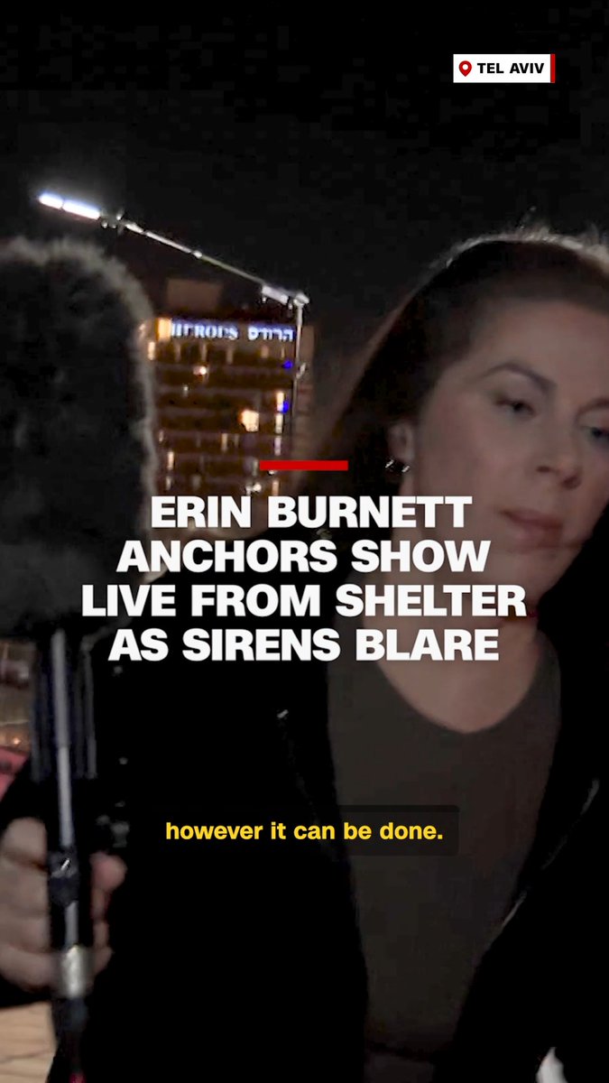 Erin Burnett takes shelter in Tel Aviv amid missile sirens while speaking with Fred Pleitgen in Tehran. CNN operates in Iran with the permission of the Iranian government, as required under local regulations, but maintains full editorial control over what it reports.
