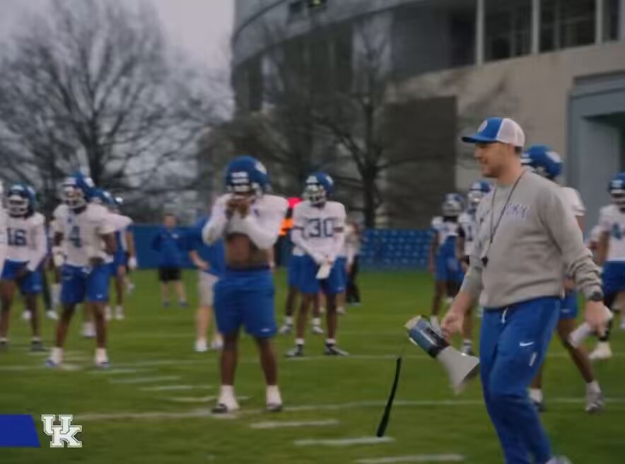 In a recent video released by Kentucky’s official football account, we got a glimpse of Will Stein’s on-field personality, and it’s relieving to say the least. He’s not on the sideline with his sunglasses on trying to act cool, or showing up late while the assistants do the work. Stein is IN THE DRILLS himself, boots on ground, helping better his team. “I’m not just gonna sit and observe, I’m gonna go be involved, because that’s what our players deserve and that’s just how I act.” There’s a new culture brewing in Lexington. 🎥: UK Athletics | #BBN