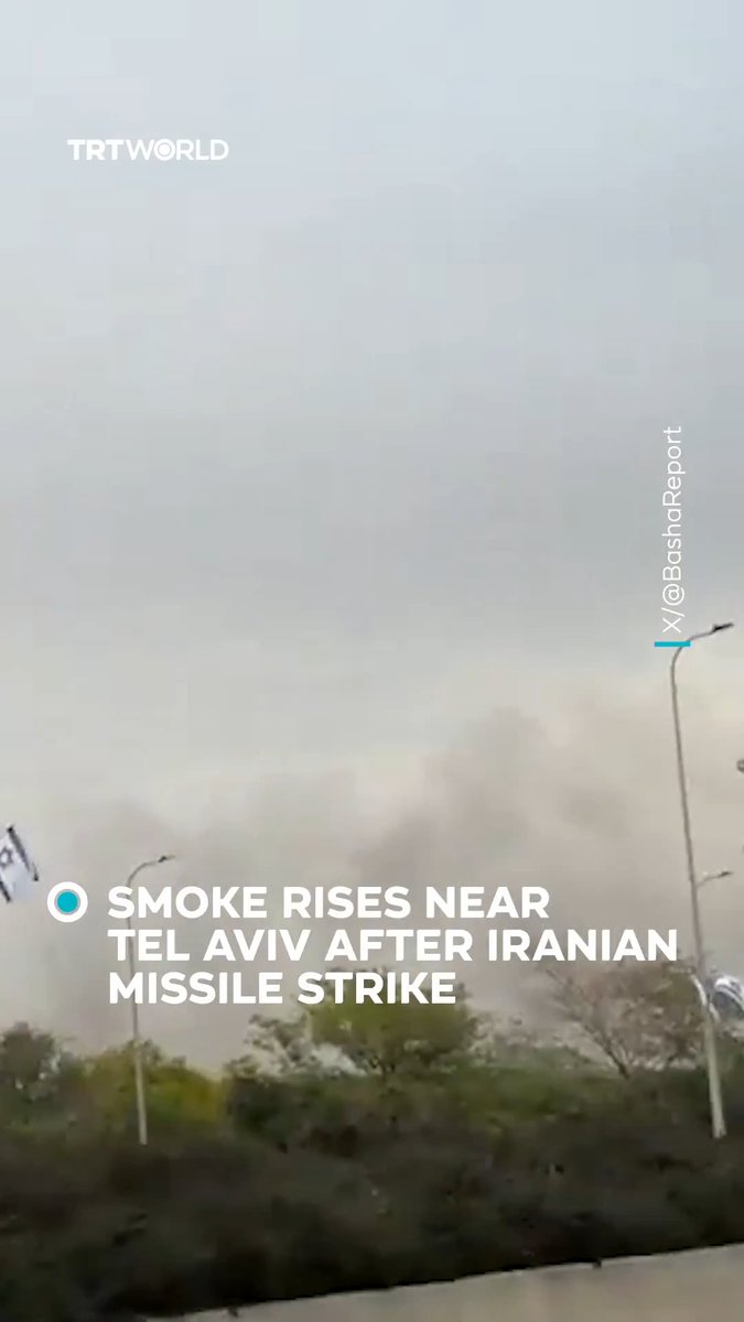 Footage shows Tel Aviv’s skyline shrouded in smoke after an Iranian missile broke through the city’s air defence systems and struck a warehouse in Holon, central Israel. Iran has launched several attacks across Israel on the same day, triggering warning alerts