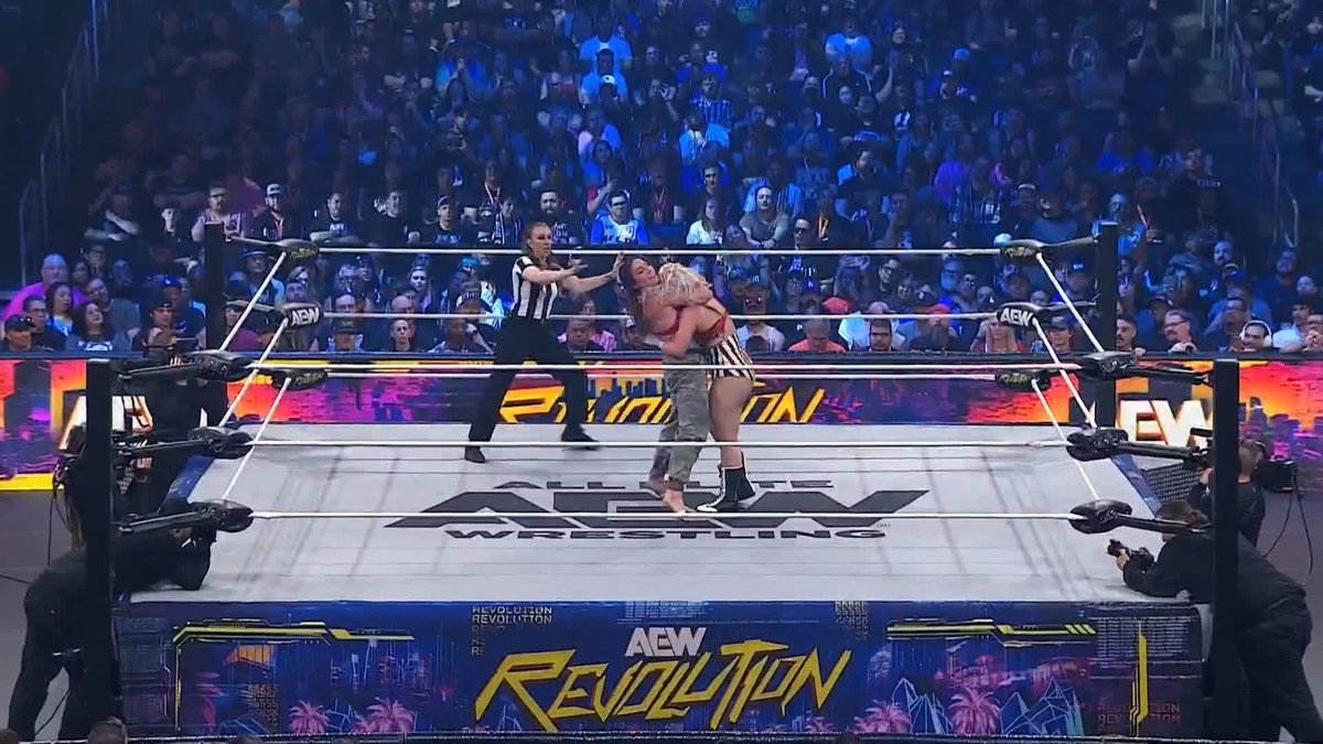 She's a biter! Watch #AEWRevolution LIVE on PPV!