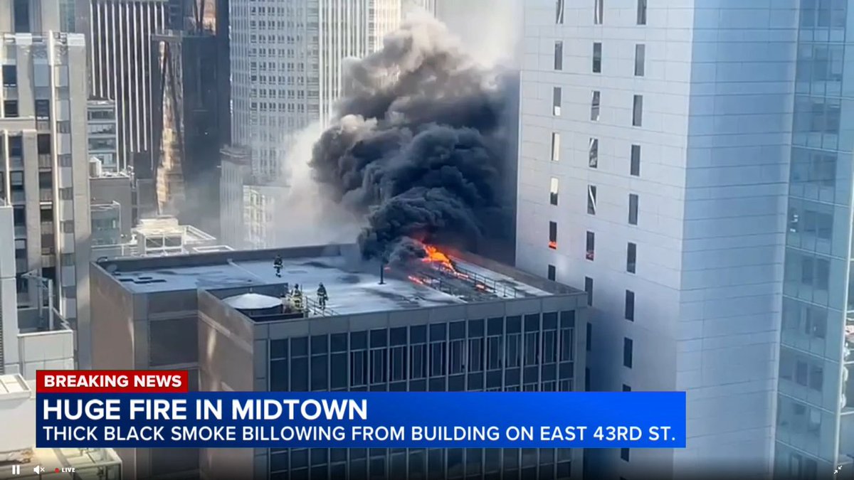 BREAKING NEWS: Thick plumes of black smoke are billowing from the roof of a building in Midtown. We'll have more updates at as this story develops.