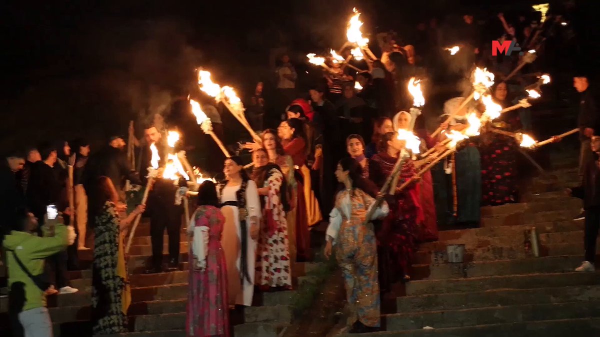Şirnex'in Cizîr ilçesinde TJA öncülüğünde kadınlar, Kürt Halk Önderi Abdullah Öcalan'ın 77'nci yaşı için 77 meşale ile Newroz ateşin yaktı