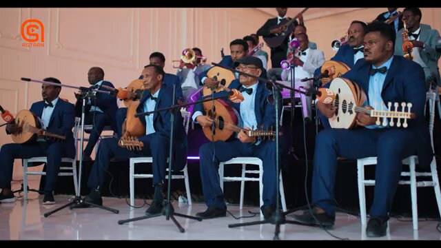 #Somali Orchestra 🇸🇴 playing a beautiful instrument and sending warm Eid wishes to all Somalis. My granddad enjoys this every Eid, filled with nostalgia for the good old Somalia.