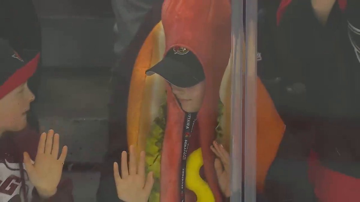 Hot dog or hockey fan? Even Thomas Chabot's trying to figure it out! 🌭