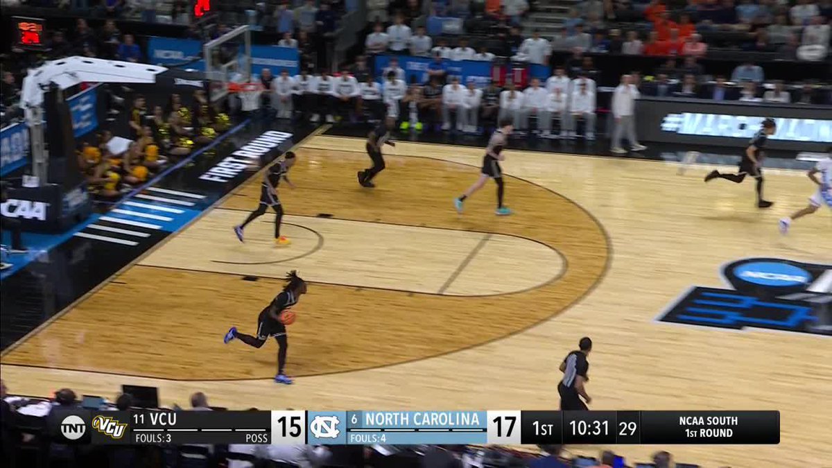 Derek Dixon transition triple 🎯 #MarchMadness Carolina Basketball