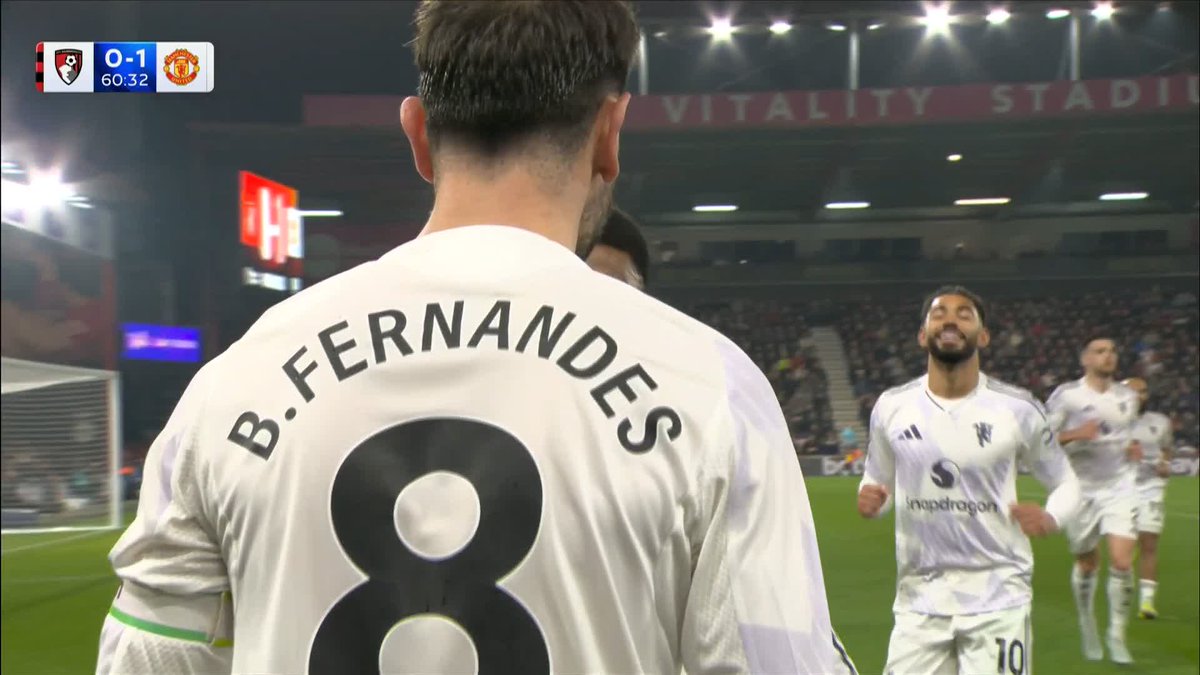 The away end erupts as Bruno Fernandes scores from the spot! 🔥
