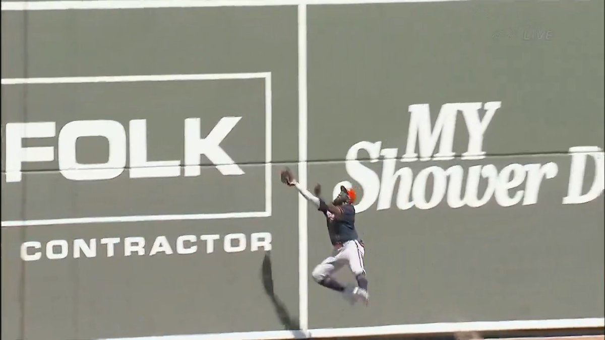 Michael Harris II leaps into the wall on a spectacular catch 👏