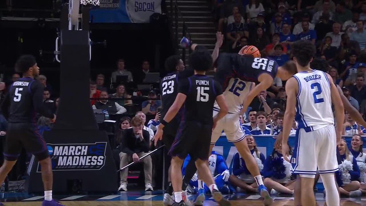 Tanner Toolson was assessed a Flagrant 1 foul after this foul on Cameron Boozer.