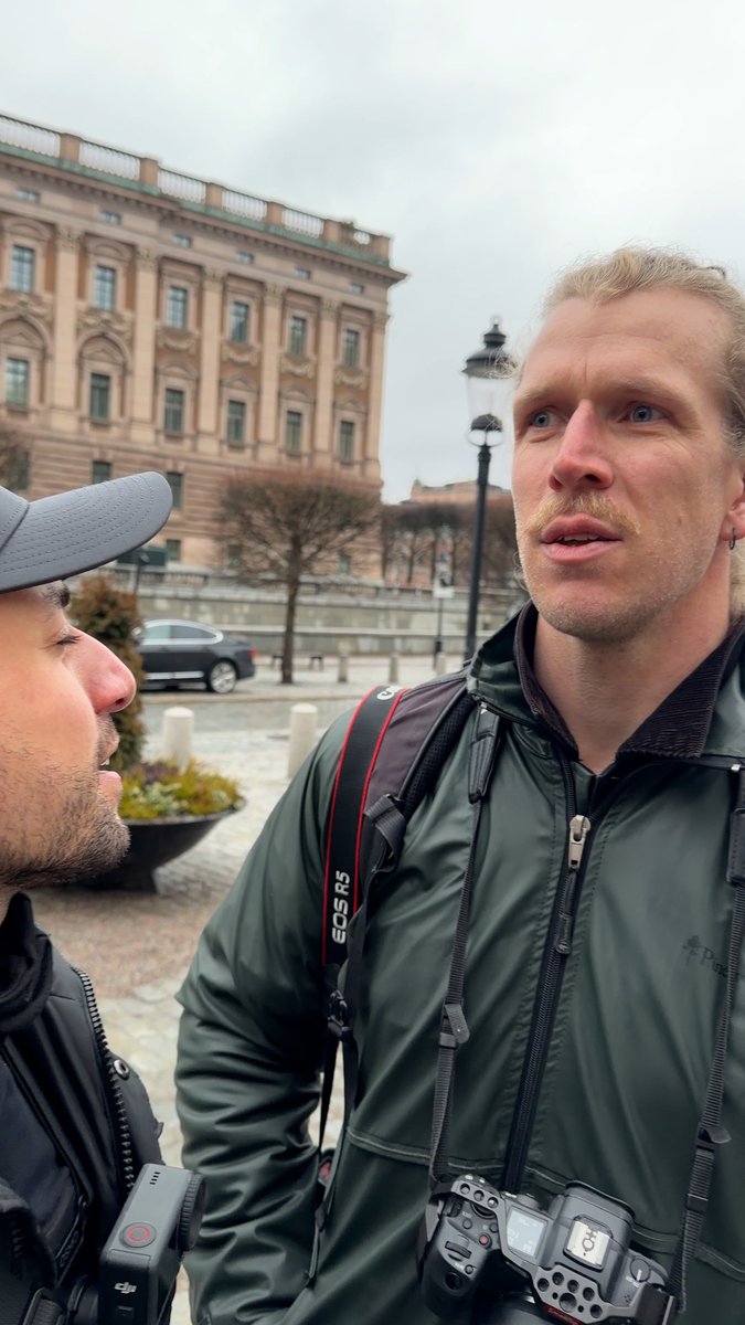 Conservative influencer Nick Alinia confronted a leftist doxxing activist at a women's rights event. These photos are fed into Expo's taxpayer-funded opinion registries, which target conservatives and threaten their livelihoods.