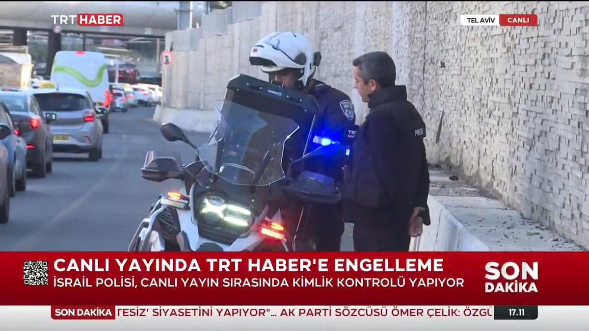 Canlı yayında TRT Haber'e engelleme. İsrail polisi, Tel Aviv'den son bilgileri aktaran TRT Haber ekibine canlı yayında kimlik kontrolü yaptı.