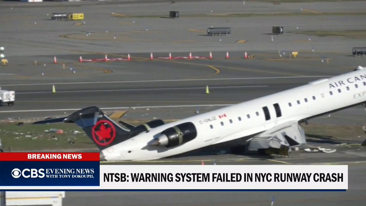 The NTSB says a runway warning system that could have prevented Sunday’s collision at LaGuardia Airport did not activate because the fire truck lacked a transponder to alert controllers to its location. Two pilots were killed and dozens were injured.