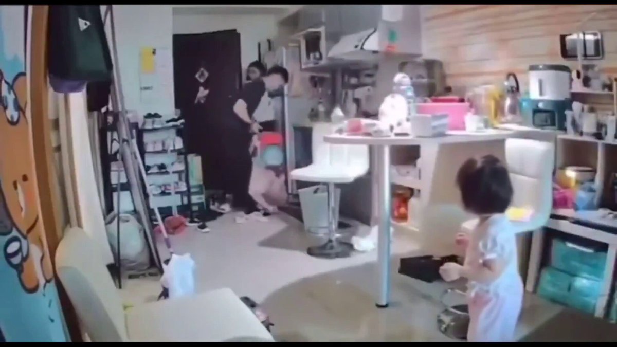 A Chinese man severely assaulting his wife and their children and throws them to the ground after his wife attempted to leave the house following a violent marital argument.😳😨 Chinese police need to arrest this man.