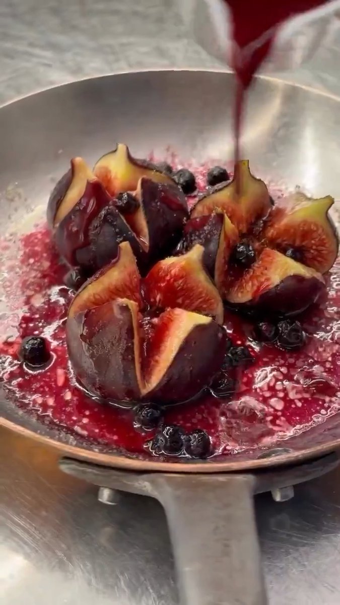 A decadent sensory symphony by French master chef Éric Fréchon. Roasted figs with blackcurrant and speculoos ice cream goodness.