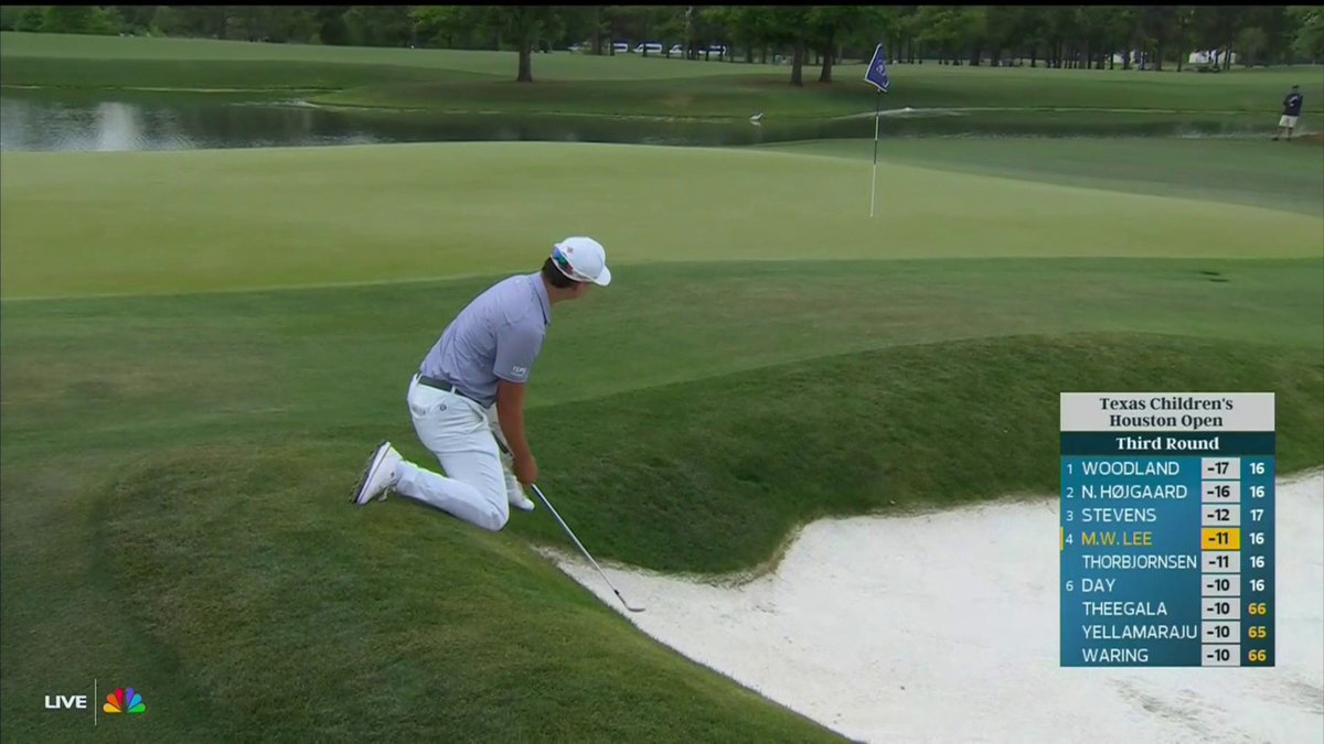 MIN WOO LEE FROM HIS KNEES. GOLF SHOT.