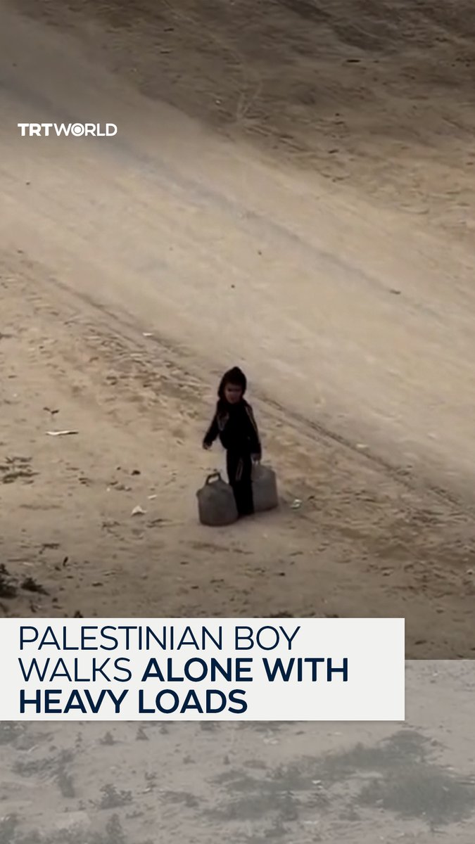 A video from Gaza shows a Palestinian boy walking alone on a road, carrying two large water containers after a long journey. The footage highlights the severe humanitarian conditions facing civilians, particularly children, amid ongoing shortages