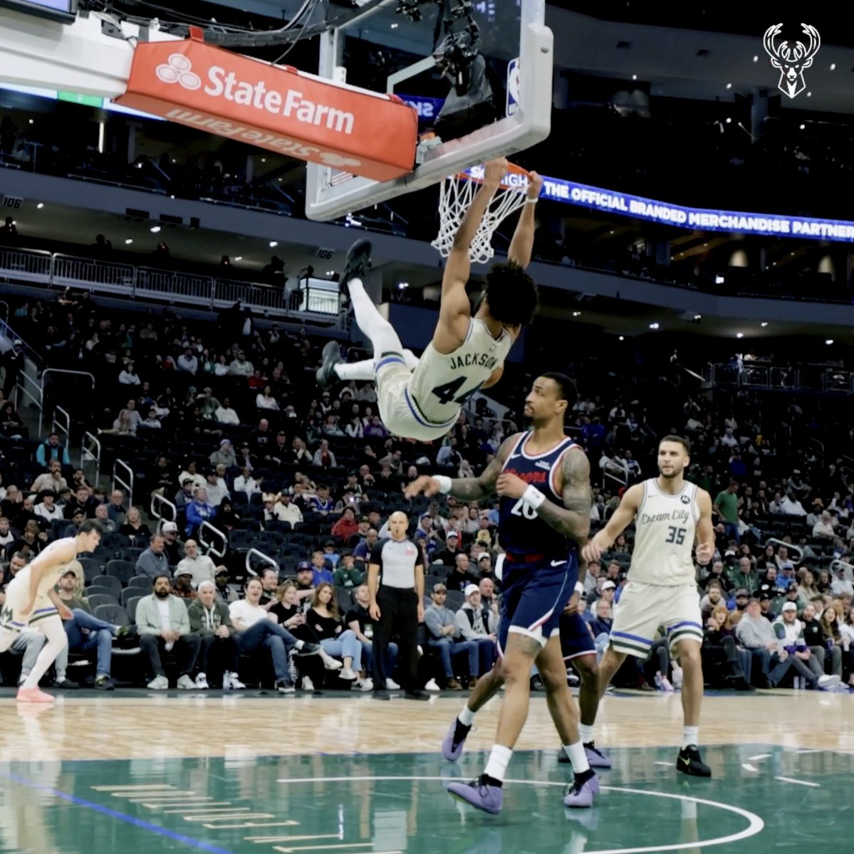 Ajax soaring to the rim.