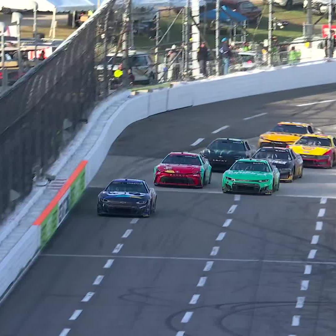 We've got big trouble in Turn 4! Carson Hocevar and Bubba Wallace are among those involved.
