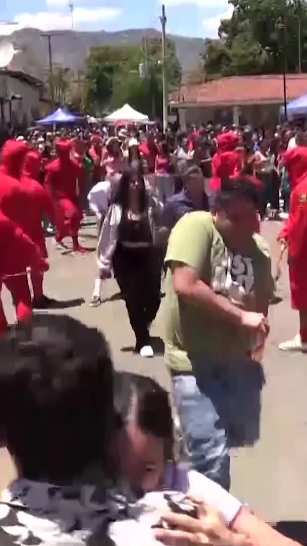 Easter week got underway in El Salvador with a centuries-old ceremony in which men dressed as devils whip people in a ritual meant to symbolize the universal struggle between good and evil.