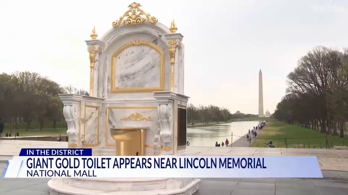 A throne with a golden toilet just went up on the National Mall, in front of the Washington Monument, protesting Trump’s grandiose White House renovations. It includes a roll of toilet paper that reads “The Secret Handshake,” from the same group responsible for the statue of Trump and Epstein.