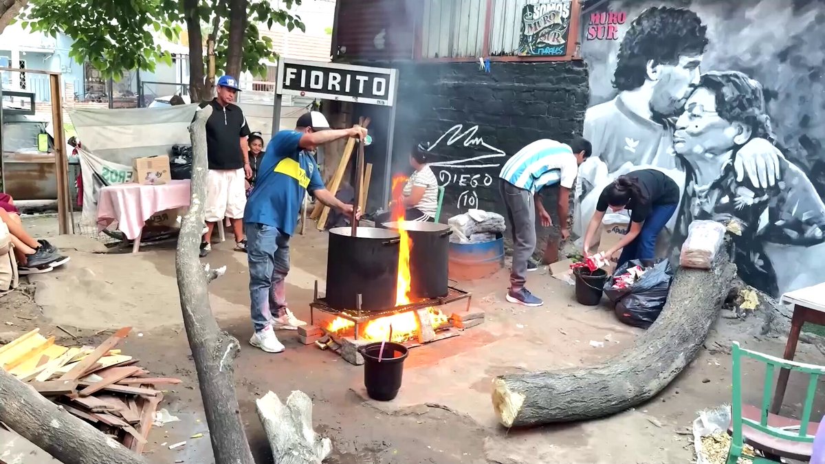 Maradona's house in Villa Fiorito, a poor neighborhood on the outskirts of Buenos Aires, now serves as a soup kitchen where a group of volunteers light a grill and cook for neighbors