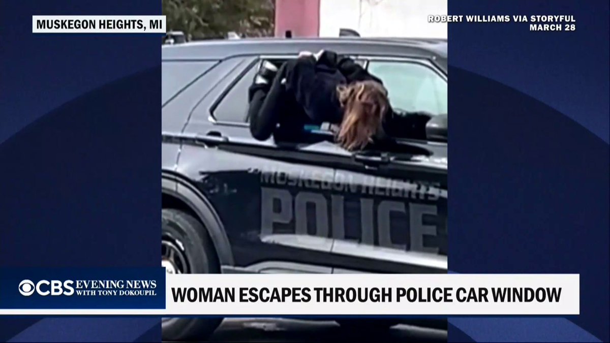 Michigan police say a handcuffed woman escaped from the back of a cruiser after officers left a window partially open. She was later re-arrested.