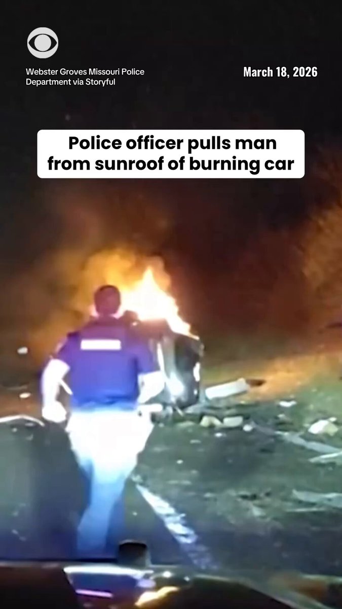 A police officer ran to the rescue of a driver who was stuck in an overturned vehicle on fire earlier this month in Webster Groves, Missouri. The officer pulled the man out of the car through the sunroof to save his life.