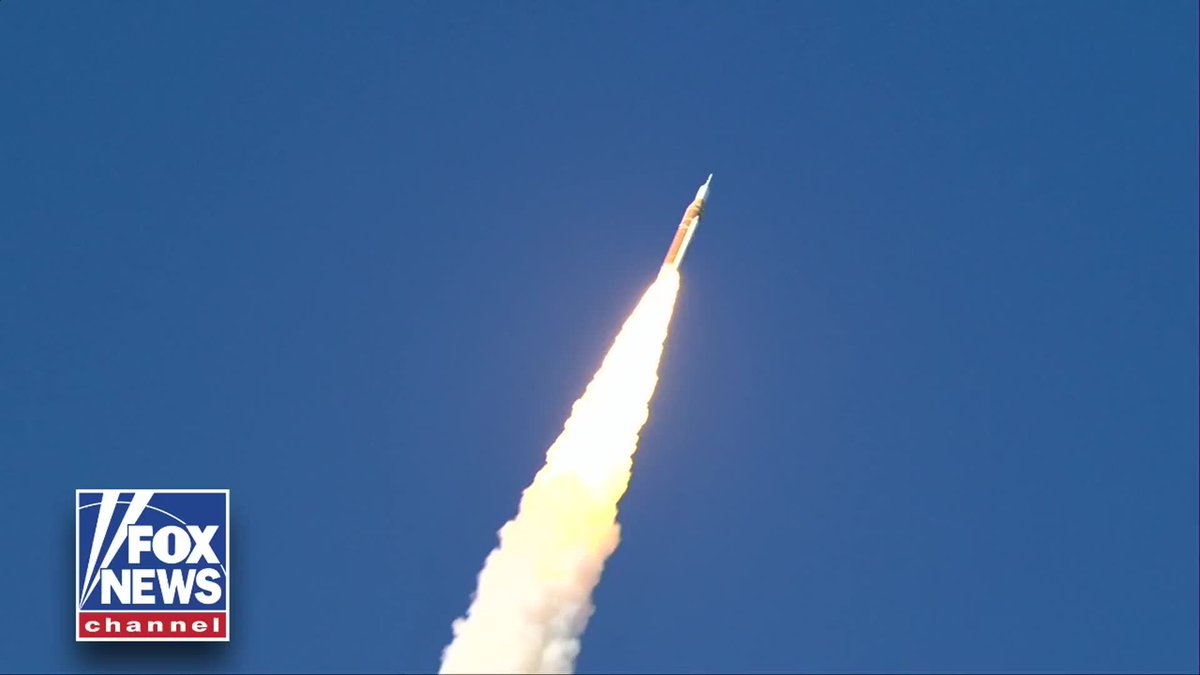 TO THE STARS: Artemis II accelerates as the rocket departs Earth's atmosphere after a historic launch.