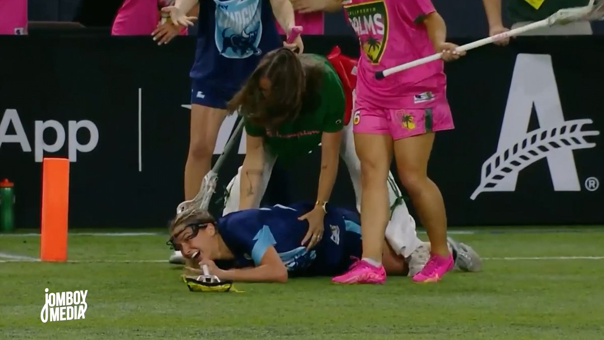 Women’s lacrosse coach knocks down an opponent for taking a swipe at her player, a breakdown