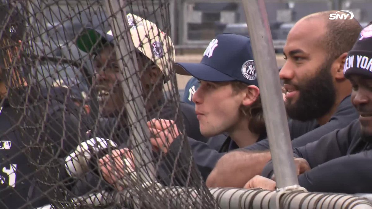 Jack Hughes watches Yankees BP behind the cage with Jazz Chisholm Jr.