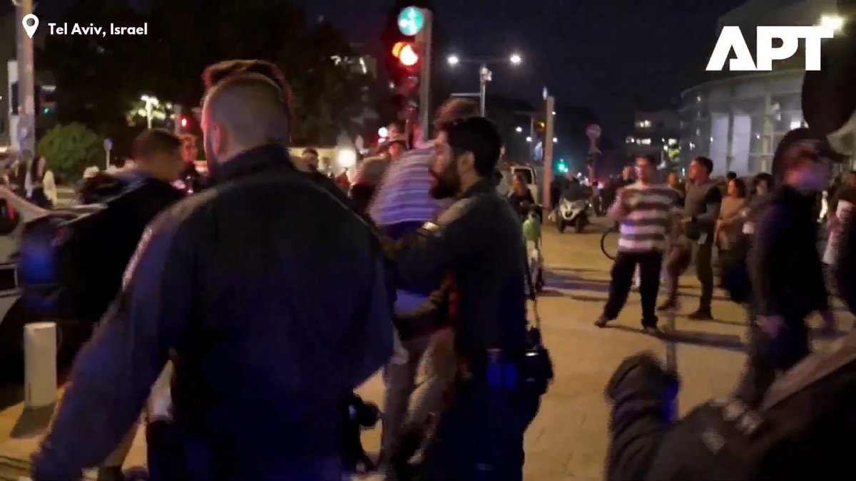 Absolute panic in Tel Aviv. Thousands of Israelis are protesting the war, holding "Justice for Palestine" signs. The Zionist regime is so terrified of internal dissent that they are violently arresting their own citizens. The global narrative is completely collapsing.