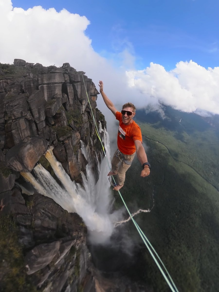 Bucket list project ✅ $500 #GoProAwards recipient Lukas Irmler made his dream come true, highlining above Angel falls, the tallest waterfall in the world. Angel Falls Fun Fact: The drop is so large that the majority of the water never actually reaches the impact zone—most turns to mist and is blown across the sprawling jungle below. #GoPro #GoProMAX #Highline #Balance