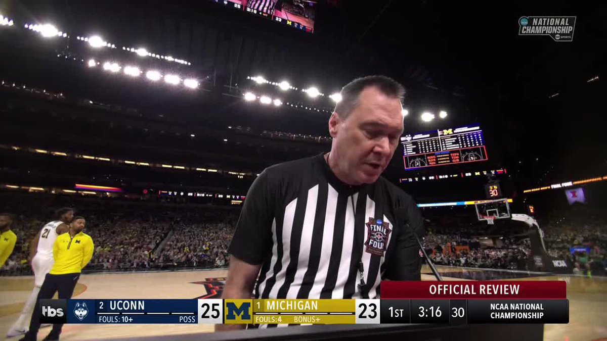 Alex Karaban was called for a Flagrant 1 foul for a "hook and hold" on this play Gene Steratore breaks it down