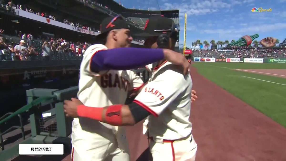 Luis, the hug should come AFTER the Gatorade bath 😂