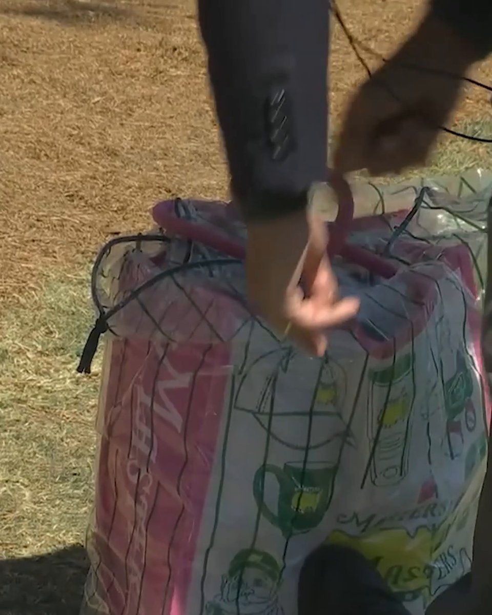Xander Schauffele's tee shot somehow ends up in a patron's bag 😂