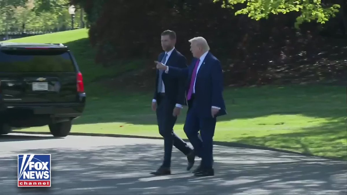 NOW: President Trump waves, departs the White House with his son Eric.